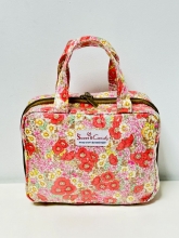Neceser cosmetiquero  impermeable Sweet Candy estampado Liberty (tono rojo, amarillo y rosa)